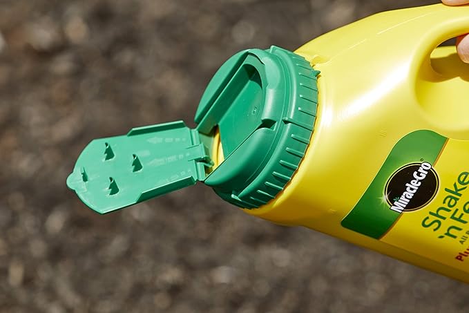 Miracle-Gro Shake 'N Feed All Purpose Plant Food Plus Weed Preventer1, Prevents Crabgrass, Common Chickweed and Common Purslane in Gardens, 4.5 lb.