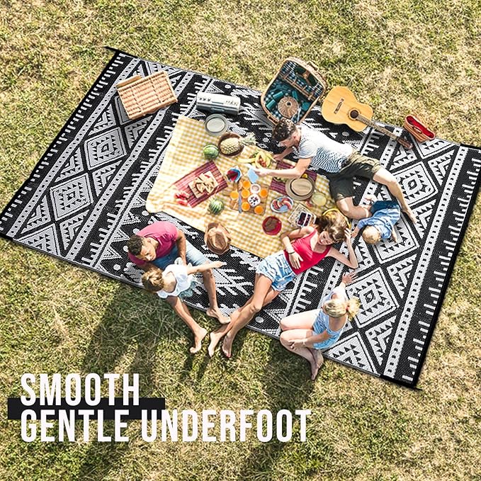 OLANLY Outdoor Rug Waterproof 6x9 ft, Reversible Outdoor Plastic Straw Rug, Boho Patio Rug, Indoor Outdoor Carpet, RV Mat Outside for Patio, Camp, Picnic, Balcony, Deck, Backyard, Black & White